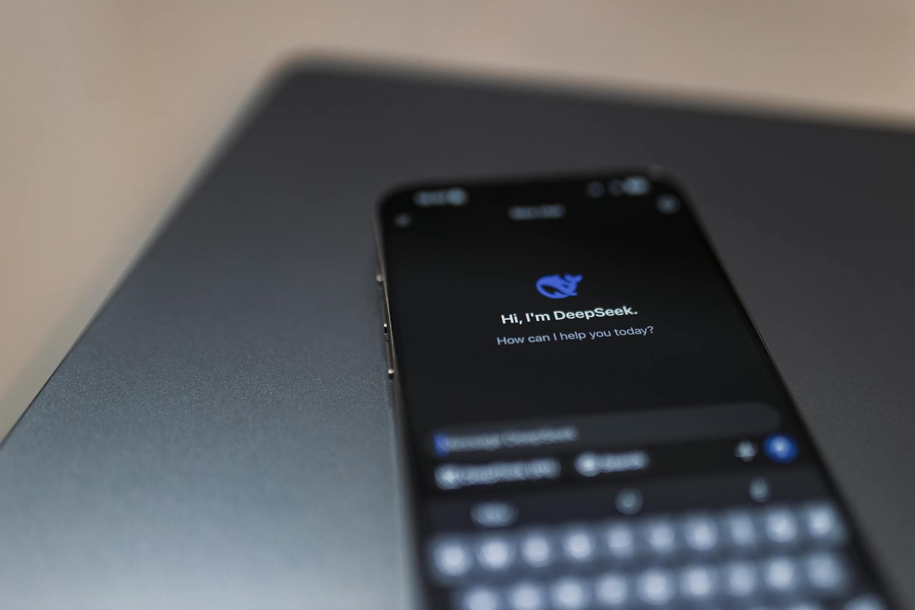 Close-up of a smartphone displaying an AI chat interface with the DeepSeek app.