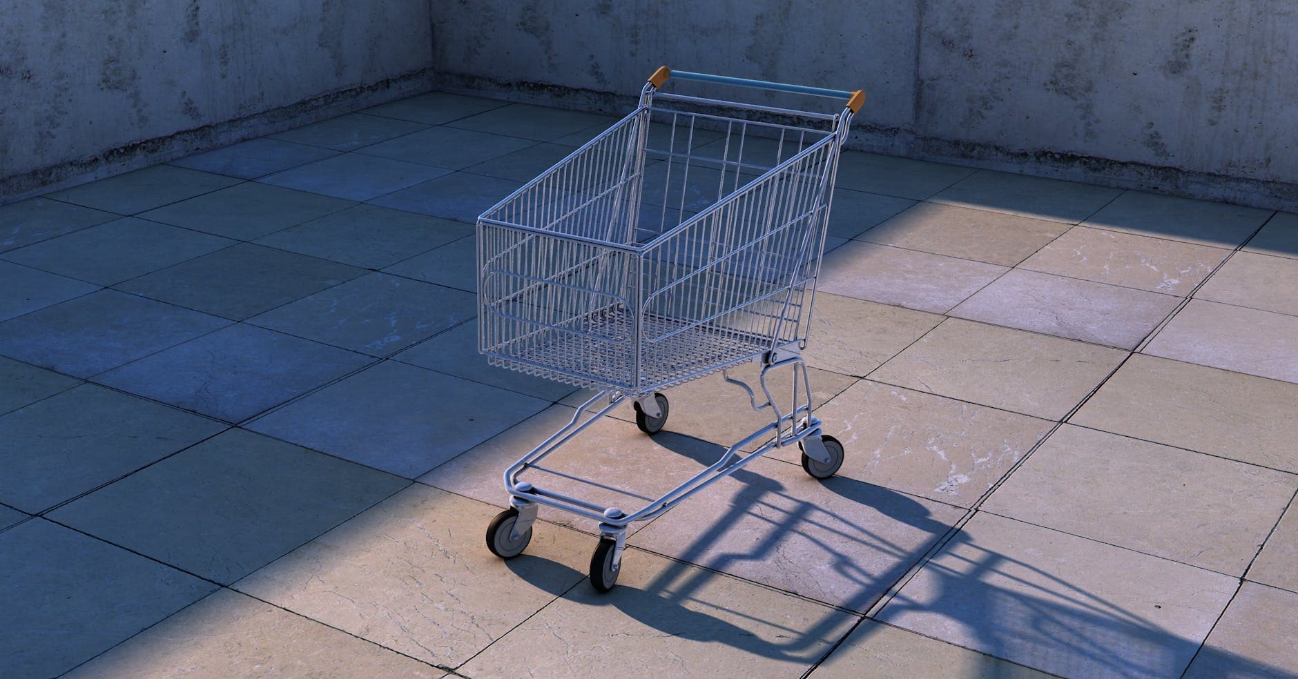 A solitary shopping cart casting a shadow on tiled pavement in an urban setting.