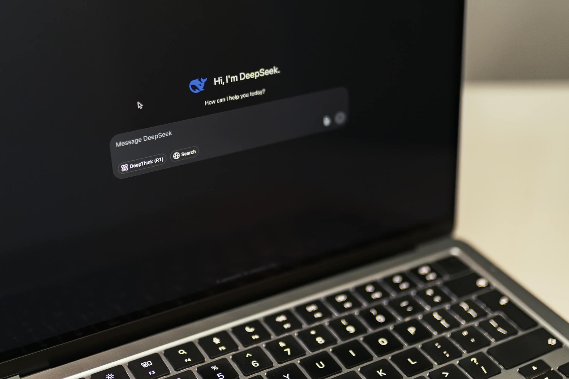 A MacBook displaying the DeepSeek AI interface, showcasing digital innovation.