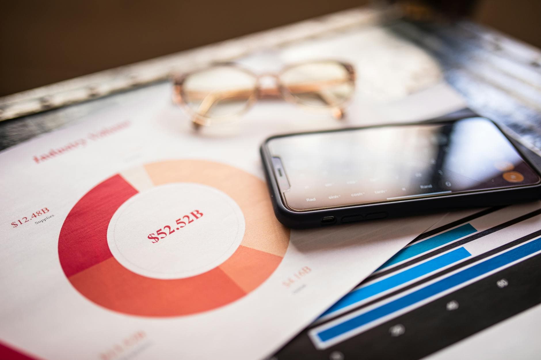 Person using a bank card for contactless payment at a modern checkout counter.