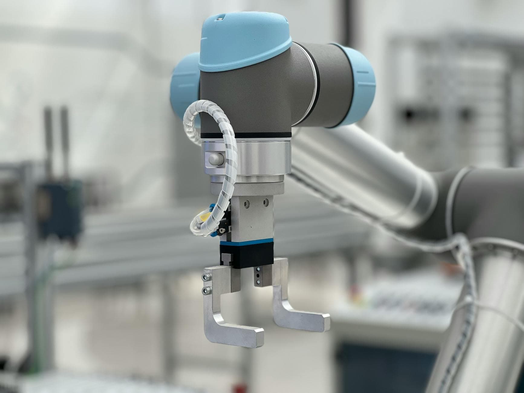 Close-up of an advanced robotic arm equipped with precision tools, showcasing technology and innovation.